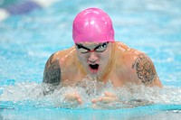 Marines Cpl. Kyle Reid swims to gold in his division of the 50 meter breaststroke finals during the 2014 Warrior Games at the Olympic Training Center in Colorado Springs, Colo. Sept. 30, 2014. Original public domain image from Flickr