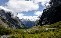 Cleddau Valley. Fiordland National Park.NZThe Milford RoadThe road into Milford is an extraordinary journey through rainforest with ever changing vista's created by glacier carved valleys, tree avalanches and the dense forests of the World Heritage Park. Original public domain image from Flickr