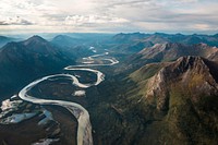 Remote River in Gates of the ArcticThe Alatna River winds its way through a long valley in Gates of the Arctic National Park and Preserve. NPS Photo / Sean Tevebaugh. Original public domain image from Flickr