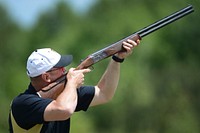 Army Maj. Dave Guida, a member of the Army Skeet Team, shoots during the 2015 Armed Services Skeet Championships. The five-day competition was held 11-15 May 2015 near the City of Richmond at Conservation Park of Virginia, Charles City, Virginia, May 14th 2015. Original public domain image from Flickr