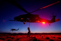 Members from the U.S. Air Force 24th Special Tactics Squadron, Fort Bragg, complete helo, fast rope and hoisting training during exercise Advanced Guard, Holloman Air Force Base, N.M., April 14, 2014.