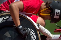 Marine Corps veteran Gabriella Graves-Wake races a wheelchair during the 2015 Department of Defense Warrior Games at Marine Corps Base Quantico, Va. June 28, 2015. Original public domain image from <a href="https://www.flickr.com/photos/dodnewsfeatures/18617820424/" target="_blank">Flickr</a>