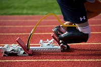 An athlete begins from the starting blocks for a 400 meter dash during the the 2015 Department of Defense Warrior Games at Marine Corps Base Quantico, Va. June 28, 2015. Original public domain image from Flickr