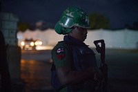 A police woman, belonging to AMISOM, patrols an area of Mogadishu, Somalia, near the city's parliament building on June 30.