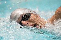 Special Operations Command&rsquo;s Sean Walsh swims freestyle during the 2015 Department of Defense Warrior Games in Manassas, Va. June 27, 2015. Original public domain image from Flickr