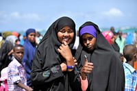 Youth at Lido beach in Mogadishu, Somalia to celebrate Eid Al-Fitr which marked the end of the Muslim holy month of Ramadan on July 17 2015. UN Photo / Ilyas Ahmed. Original public domain image from Flickr