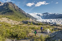 Camping along the Root Glacier. NPS photo by Neal Herbert. Original public domain image from Flickr