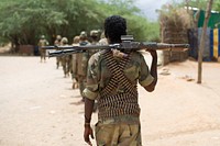 Somali soldiers on foot patrol in Baardheere, Somalia. Original public domain image from Flickr