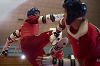 Army 1st Lt. Joshua Fletcher, right, and Air Force Tech Sgt. Quinton Beach spar during U.S. Armed Forces Tae Kwon Do Team practice at Fort Indiantown Gap, Pa. Sept. 21, 2015.