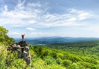 Beautiful nature background, tourist standing on the cliff. Free public domain CC0 photo.