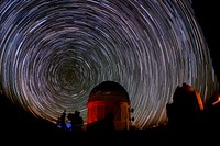 Cerro Tololo Observatory and star trails. Stars over the Cerro Tololo Inter-American Observatory in Chile uses the new Dark Energy Camera (DECam) on a telescope there to find the distant dwarf planet 2012 VP 113. Original public domain image from Flickr