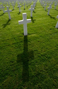 A shadow is cast from a U.S. Military member&rsquo;s gravestone during a Veterans Day event at the Luxembourg American Military Cemetery in Luxembourg on Nov. 11, 2015.