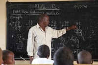 A teacher conducts a mathematics lesson at Ganane Primary and Secondary School in Kismayo, Somalia.