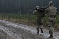 U.S. Soldiers assigned to the 3rd Squadron, 2nd Cavalry Regiment carry a weighted litter on the second day of the unit’s 3-day sniper school try-outs in Bemowo Piskie, Poland, Jan. 3, 2018.