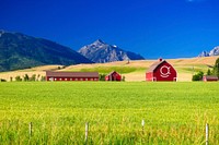 Red Barns and Mountains at Joseph, Wallowa Whitman National Forest, Enterprise and Joseph Oregon Scenery in the Wallowa Whitman National Forest. Original public domain image from Flickr