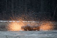 A M67 fragmentation grenade explodes during live-fire training at Kraft Range. Original public domain image from Flickr