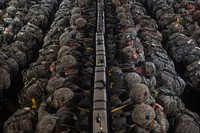 U.S. Army Soldiers with the 4th Infantry Brigade Combat Team (Airborne), 25th Infantry Division sit in a C-17 Globemaster III assigned to the 517th Airlift Squadron prior to conducting an airborne jump during Large Package Week at Joint Base Elmendorf-Richardson, Alaska, April 5, 2016. LPW is an exercise that strategically airdrops troops from the 4th Infantry Brigade Combat Team (Airborne), 25th Infantry Division from Air Force C-17A Globemaster III aircraft. (U.S. Air Force photo by Senior Airman James Richardson/Released). Original public domain image from Flickr