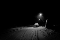 Street covered in snow at night. Original public domain image from Flickr
