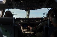 A U.S. Air Force C-17 Globemaster III assigned to the 517th Airlift Squadron flies in formation during a low-level flight for Large Package Week at Joint Base Elmendorf-Richardson, Alaska, April 5, 2016. Original public domain image from Flickr