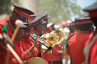 A military band plays during a parade at the Somali Armed Forces Headquarters to celebrate the army's 56th anniversary in Mogadishu, Somalia, on April 12. AMISOM Photo / Tobin Jones. Original public domain image from Flickr