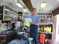 5.18.16 FCC Connect2Health Task Force Beyond the Beltway Series – Houston, TXVicky Bewley demonstrates how ETHAN uses mobile devices such as iPads to transmit critical information from the ambulance to physicians in other locations. Original public domain image from Flickr