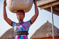 USAID in Ghana: Shea Butter Processing. USAID and the Global Shea Alliance partner to connect West Africa village women to the global marketplace. Photo: Douglas Gritzmacher/USAID. Original public domain image from Flickr