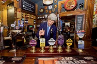 Secretary Kerry Draws a Pint of Bitter at the Historic King Arms Pub in Oxford