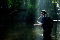 Aaron Baker goes fly fishing in the Davidson Campground, Pisgah National Forest, NC, July 29, 2017. (USDA Photo by Lance Cheung). Original public domain image from Flickr