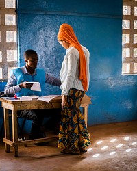 Sierra Leone Elections. USAID in Sierra Leone works to increase participation in social, political and economic activities to improve the quality of life for women, men, families and communities. Photo credit: Carol Sahley/USAID. Original public domain image from Flickr