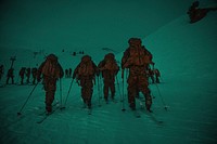 U.S. Marines from the Mountain Leaders Section, Mountain Warfare Training Center, Bridgeport, Calif., begin their ascent for the main touring event at the Mountain Troops Winter Challenge 2018, Chamrousse, France, March 14, 2018.
