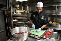 NAVAL SUPPORT ACTIVITY SOUDA BAY, Greece (May 10, 2018) Culinary Specialist Seaman Recruit Sarah Williams, from Pennsauken, New Jersey, chops strawberries aboard the Arleigh Burke-class guided-missile destroyer USS Donald Cook (DDG 75) at Naval Support Activity Souda Bay, Greece, May 10, 2018.