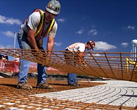 Iron Workers Install Wire Reinforcement Mesh Prior to the Pouring of the Silo 3 Concrete for the Interim Storage Area. Original public domain image from Flickr