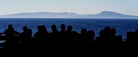STRAIT Of GIBRALTAR (June 13, 2016) – Sailors look on as the aircraft carrier USS Dwight D. Eisenhower (CVN 69) (Ike) transits through the Strait of Gibraltar into the Mediterranean Sea. Ike, the flagship of the Eisenhower Carrier Strike Group, is conducting naval operations in the U.S. 6th fleet area of operations in support of U.S. national security interests in Europe.