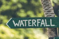 Waterfall sign in the jungle of Bali island. Free public domain CC0 image.