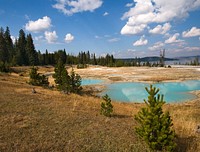 West ThumbThe water level in many of the pools of the West Thumb Geyser Basin appears to have dropped since Jackson first photographed them in August 1871 by Bradly J. Boner Original public domain image from Flickr