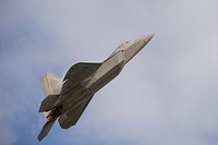 Arctic Thunder Open House 2018An F-22 Raptor takes off during the Joint Forces Demonstration at the Arctic Thunder Open House on Joint Base Elmendorf-Richardson, Alaska, June 30, 2018. During the biennial open house, JBER opens its gates to the public and hosts multiple performers including the U.S. Air Force Thunderbirds, JBER Joint Forces Demonstration and the U.S. Air Force F-22 Raptor Demonstration Team. (U.S. Air Force photo by Senior Airman Javier Alvarez). Original public domain image from Flickr