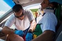 An emergency medical technician, assigned to the 146th Medical Group at the 146th Air Lift Wing in Port Hueneme, Calif., provides medical treatment to a simulated car accident victim during the 2016 EMT Rodeo at Cannon AFB, N.M., Aug. 26, 2016.