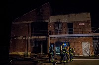 Fighterfighters prepare to enter a building during live burn training at the Anthony "Tony" Canale Training Center in Egg Harbor Township, N.J., Sept. 18, 2018.