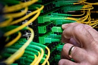 North Central Telephone Cooperative Corporation (NCTC) Central Office Technician Eddie Blankenship installs a fiber optic jumper cable at the Data Center, in Lafayette, Tennessee, on Sept 27, 2018.