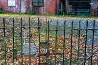 Abandoned house with locked fence. Original public domain image from Flickr