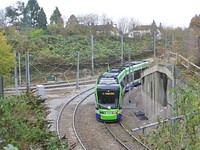 Stadtler Croydon / London Tramlink tram No. 2560 slowly negotiating a section of sharply curved track near to Sandilands tram stop.