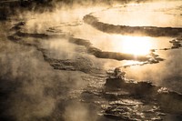 Great Fountain Geyser terraces at sunset. Original public domain image from Flickr