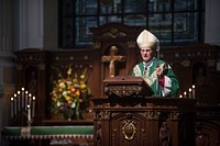 Orthodox bishop speaking from podium. Original public domain image from Flickr