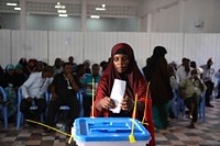 A delegate from Somaliland votes during the ongoing electoral process in Mogadishu, Somalia, on December 25, 2016. UN Photo / Ilyas Ahmed. Original public domain image from Flickr