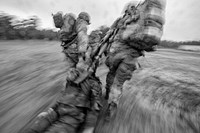 New Jersey Army National Guard combat medics pull simulated casualties to safety during a tactical trauma care course on Joint Base McGuire-Dix-Lakehurst, N.J., Sept. 28, 2018.