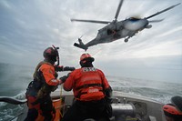 HAMPTON BAYS, NY - Airmen with 101st Rescue Squadron and 103rd Rescue Squadron conduct hoist training with United States Coastguardsmen from US Coast Guard Station Shinnecock December 22, 2016.