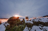 A Croatian Soldier assigned to Battle Group Poland presses the remote trigger to a Vulcan M-92 rocket launcher, firing a barrage of missiles in support of Operation Raider Thunder at Bemowo Piskie Training Area, Poland, Feb. 6, 2019.