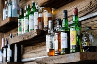 Alcoholic Drinks on the Shelves of a Bar.