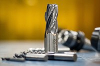 Drill bits used for cutting sit on a table at the 3rd Maintenance Squadron metals fabrication shop on Joint Base Elmendorf-Richardson, Alaska, Jan. 27, 2017. Original public domain image from Flickr