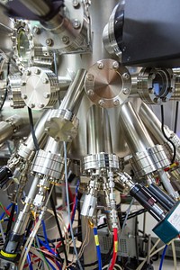 An up-close view of parts of sections of the molecular beam epitaxy system in the semiconductor growth lab at the Solar Energy Research Facility (SERF) at National Renewable Energy Laboratory (NREL). Original public domain image from Flickr